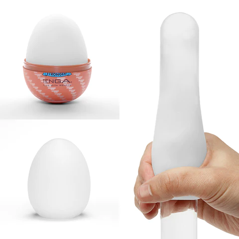 How to Use: A demonstration of the TENGA EGG Hard Boiled II Disposable Male Masturbator stretched along a long cylindrical object.